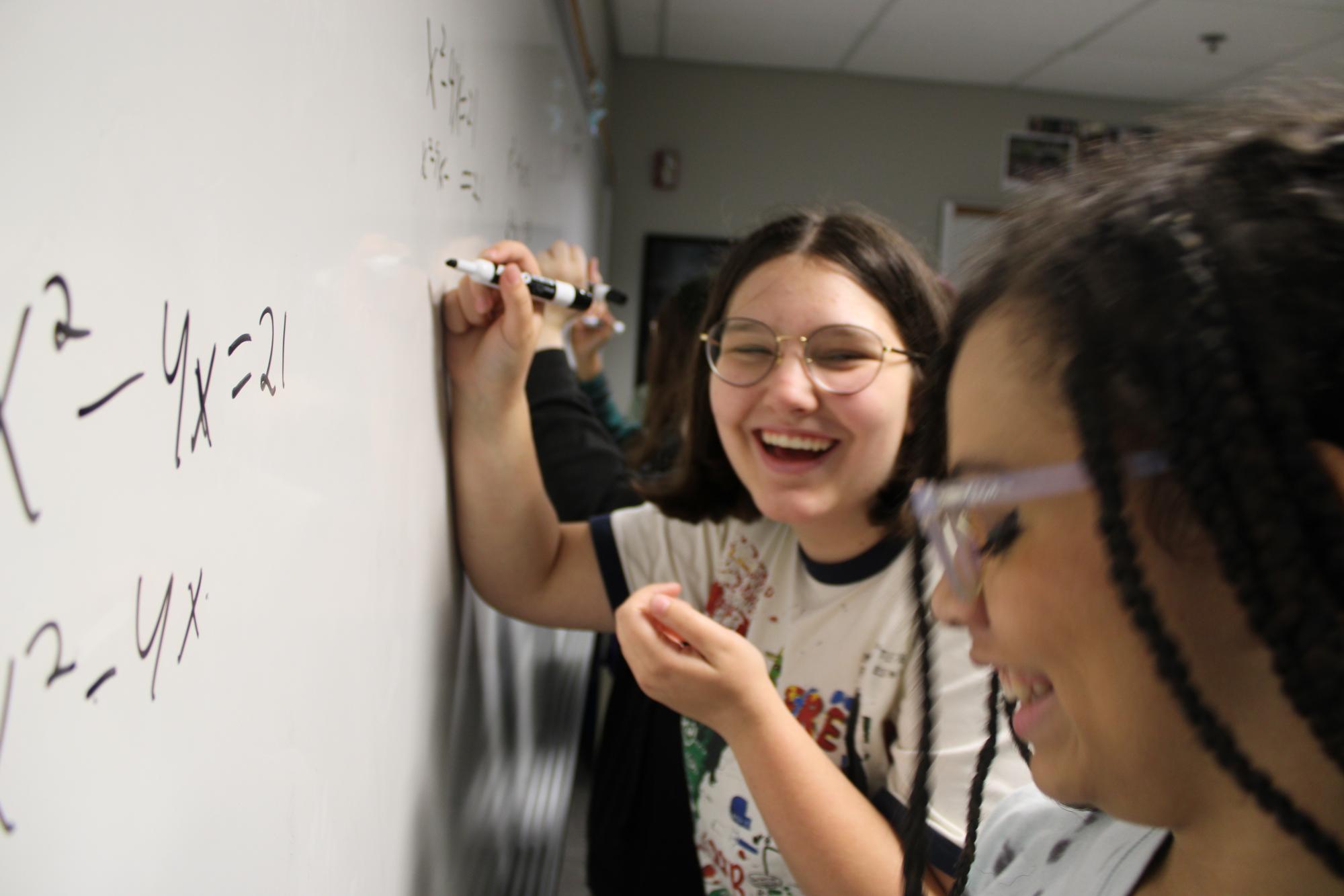 Students at whiteboard