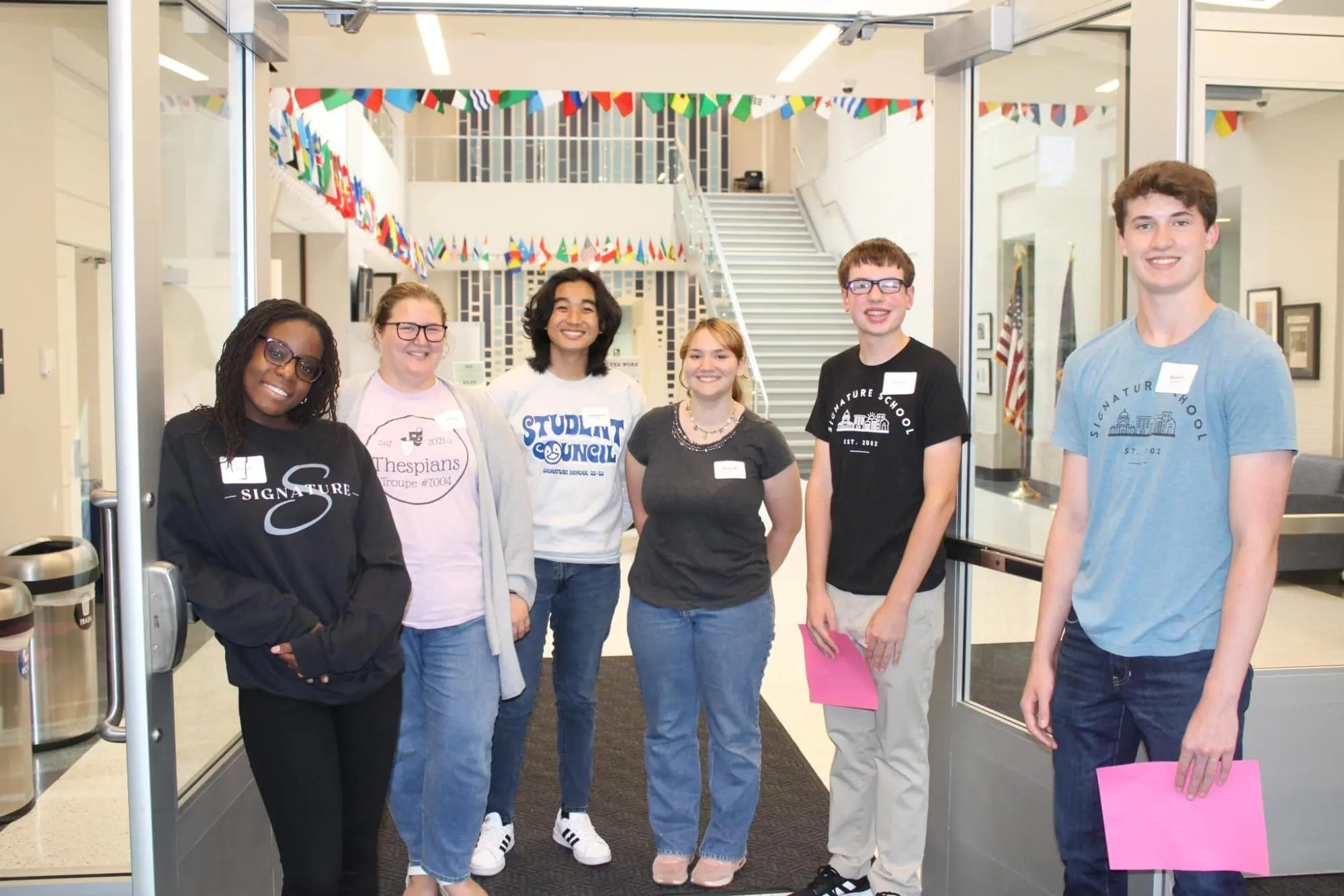 Group of Students in Sig Shirts