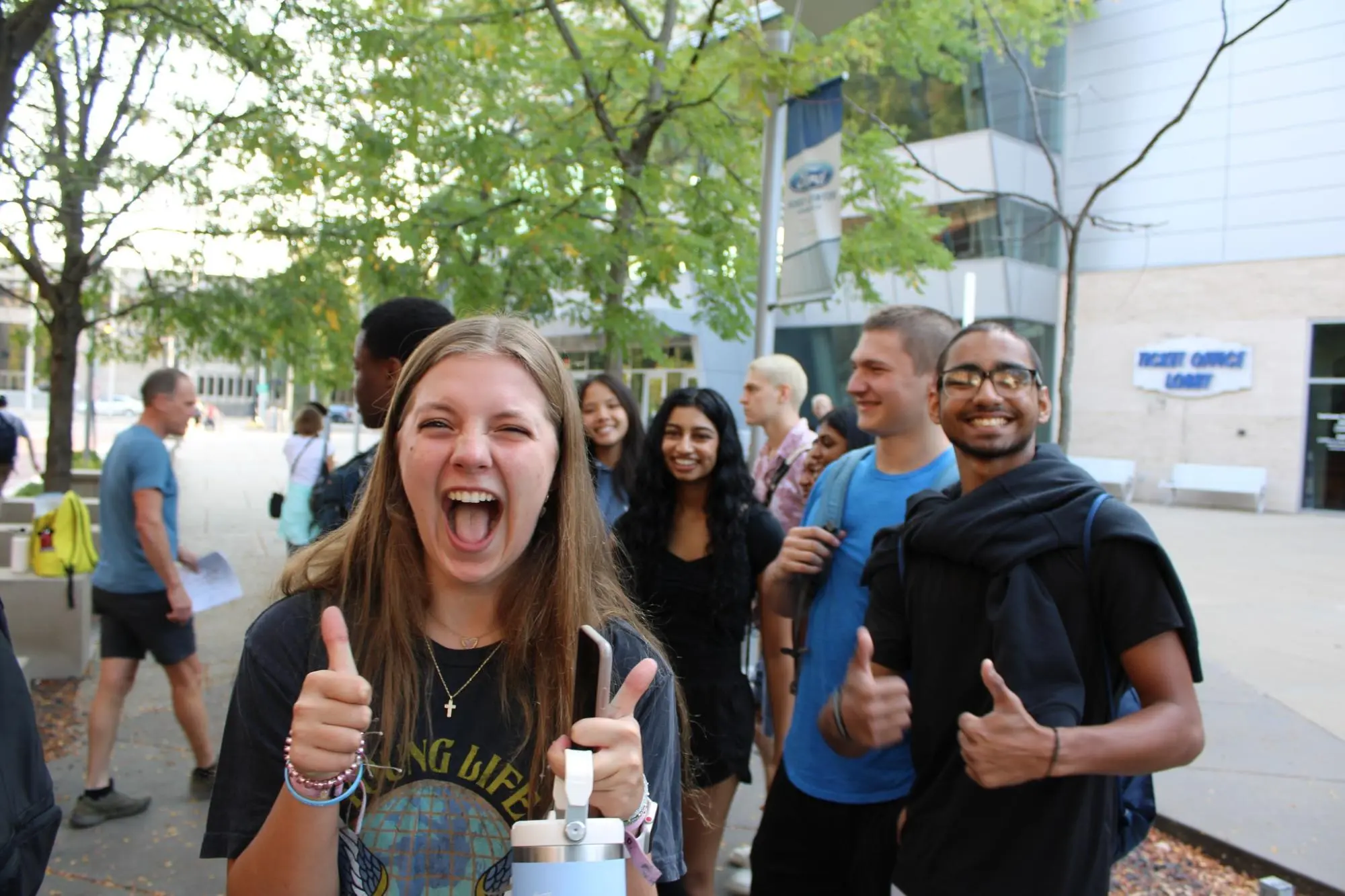 Student with Thumbs Up