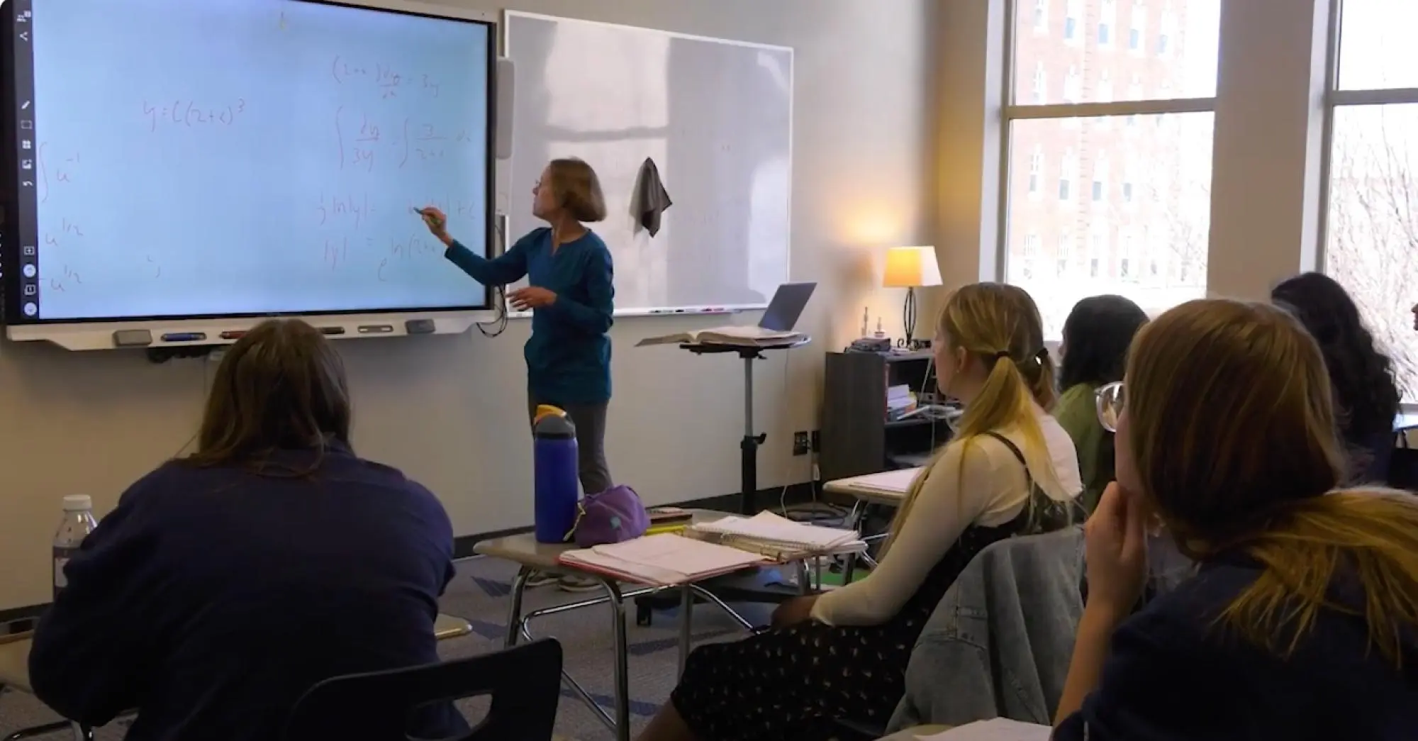 Teacher at the whiteboard