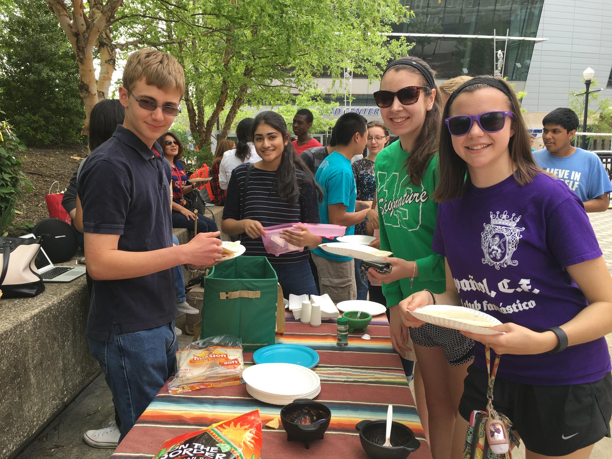 students eating outside